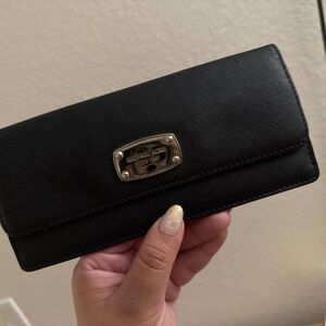 Michael kora wallet